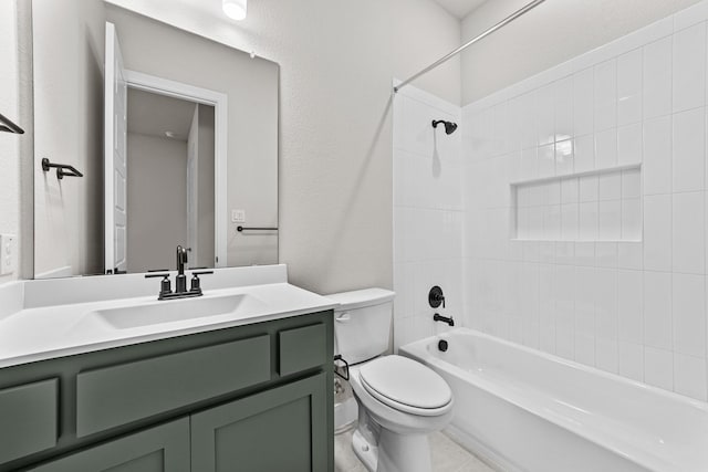 full bathroom with vanity, tub / shower combination, and toilet