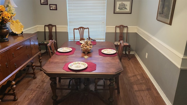 dining area featuring dark hardwood / wood-style floors