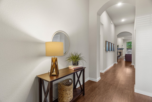 hall with dark hardwood / wood-style floors