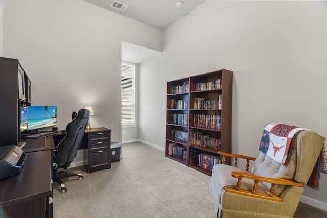 home office with light colored carpet