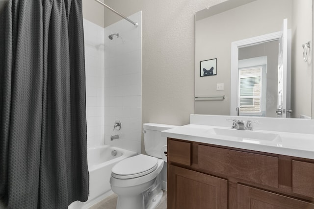 full bathroom featuring vanity, toilet, and shower / tub combo with curtain