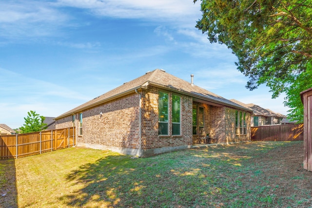 exterior space with a lawn