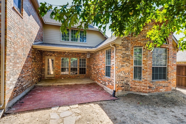 back of property with a patio area