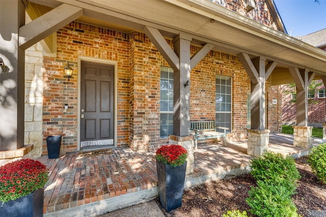 entrance to property with a porch