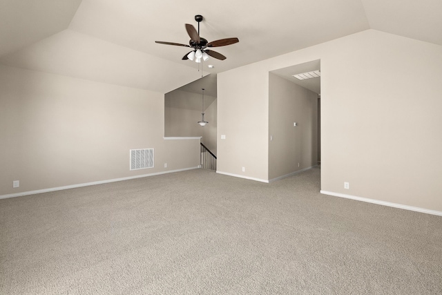 bonus room with lofted ceiling, carpet flooring, and ceiling fan