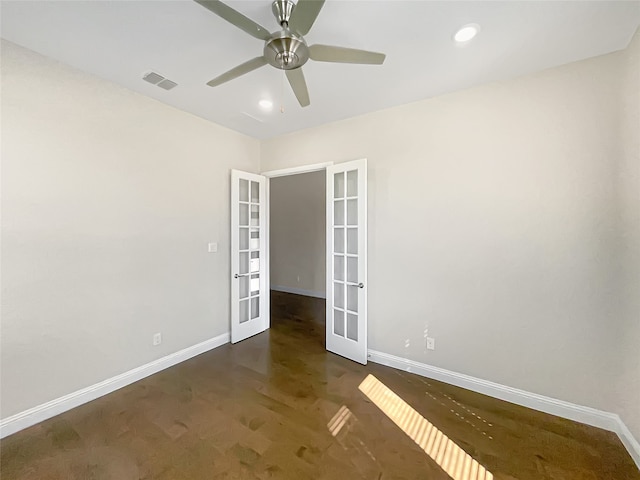 unfurnished room with french doors and ceiling fan