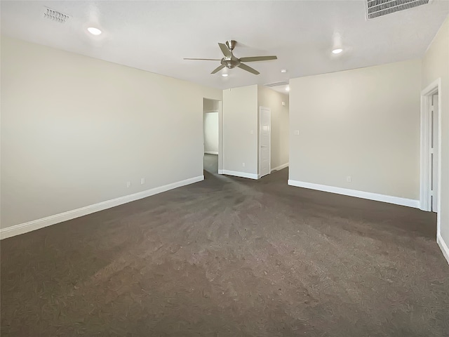 carpeted empty room featuring ceiling fan