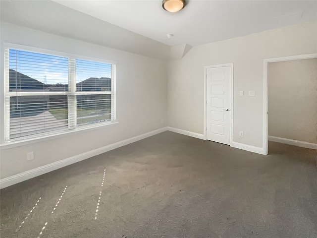 interior space with dark colored carpet