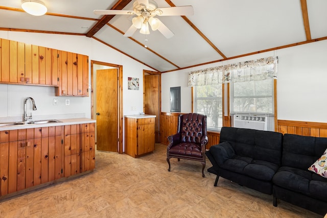 living room with ceiling fan, cooling unit, wood walls, lofted ceiling with beams, and sink