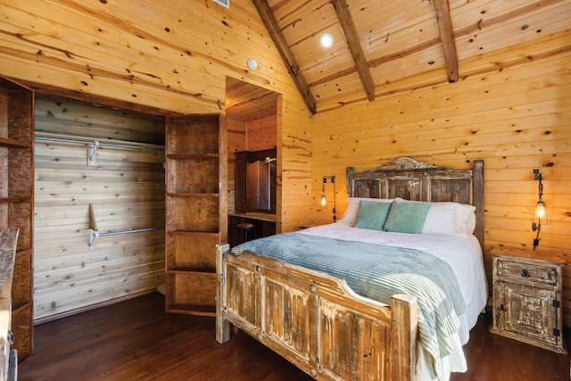 bedroom featuring lofted ceiling with beams, wooden walls, and dark hardwood / wood-style flooring