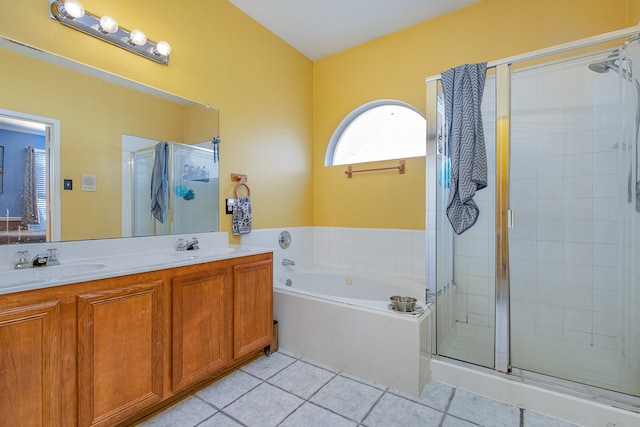 bathroom with vanity, independent shower and bath, and tile patterned flooring