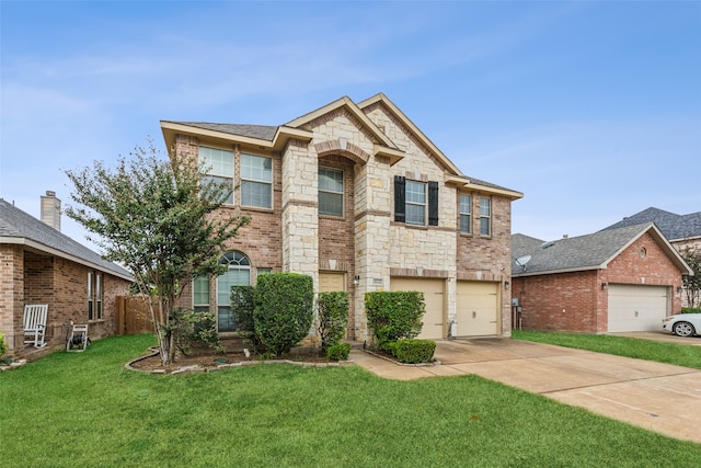 view of front of property with a garage and a front lawn