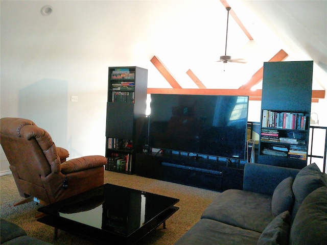 living room with vaulted ceiling, carpet, and ceiling fan