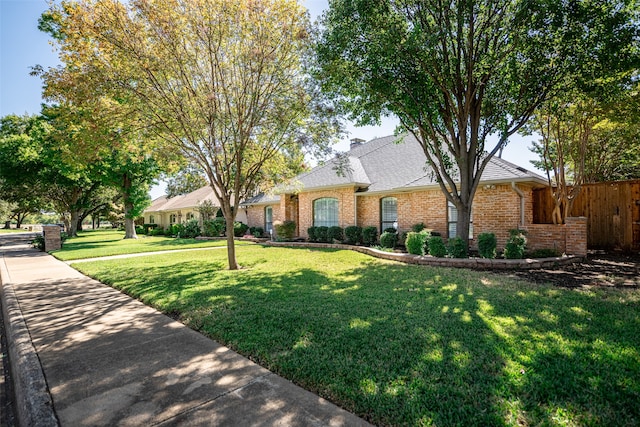 ranch-style house with a front yard