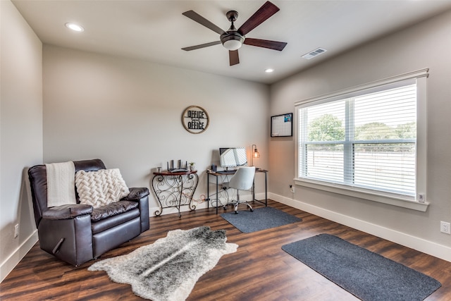 office space featuring ceiling fan and dark hardwood / wood-style floors