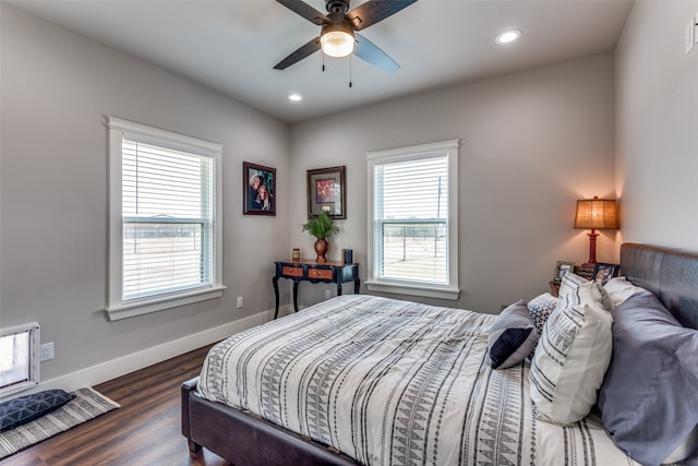 bedroom with dark wood-type flooring and ceiling fan