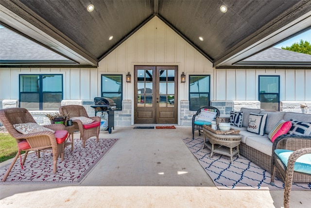 view of patio / terrace featuring french doors, an outdoor living space, and area for grilling