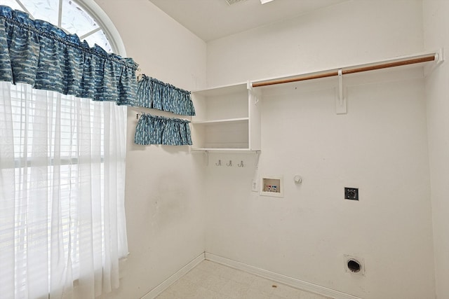 clothes washing area with hookup for an electric dryer, gas dryer hookup, and washer hookup