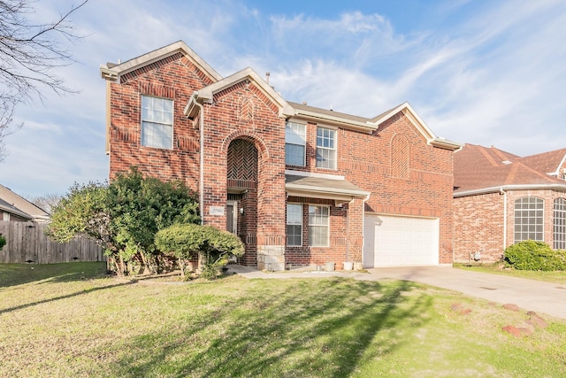 view of property featuring a garage and a front yard