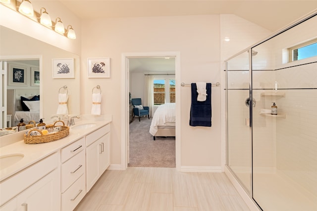 bathroom with a shower with shower door, plenty of natural light, and lofted ceiling