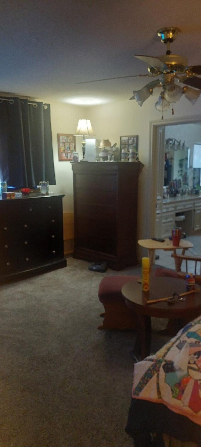 bedroom featuring carpet floors and ceiling fan