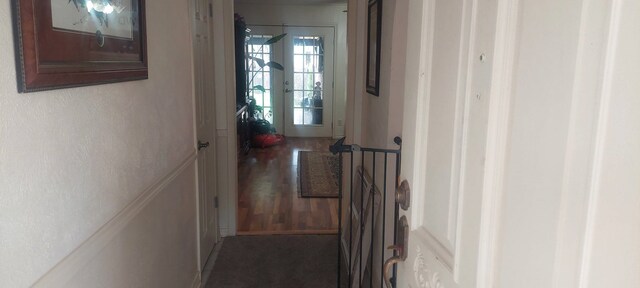 corridor with tile patterned floors