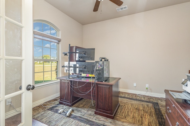 office space with lofted ceiling and ceiling fan