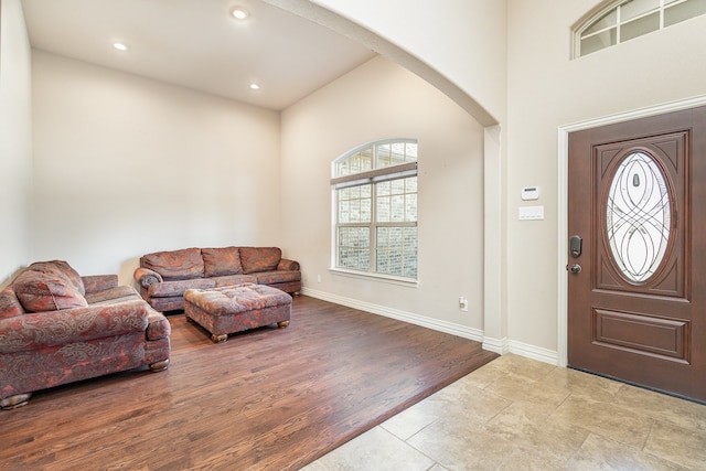 foyer entrance with light hardwood / wood-style floors