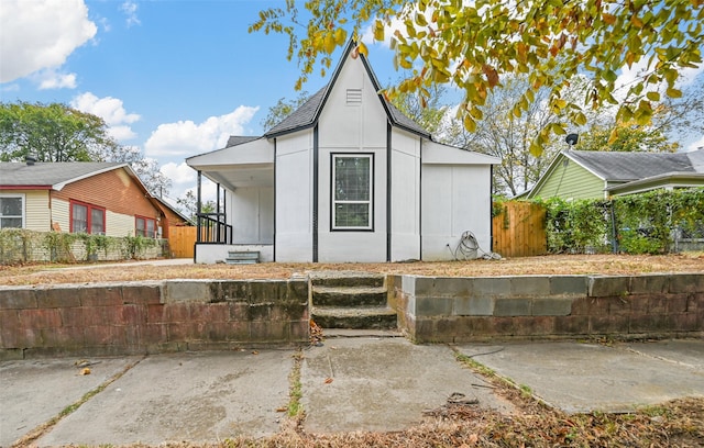 view of outbuilding with covered porch