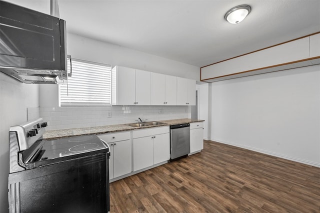 kitchen with sink, white cabinets, stainless steel appliances, and dark hardwood / wood-style floors