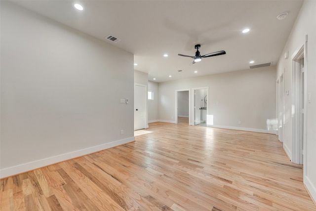 unfurnished room featuring light hardwood / wood-style floors and ceiling fan