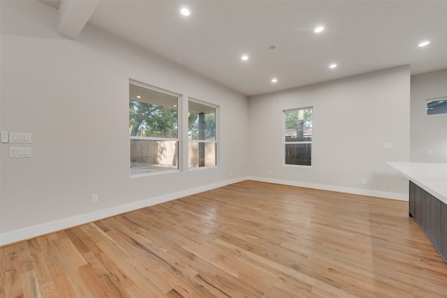 unfurnished living room featuring light wood-type flooring