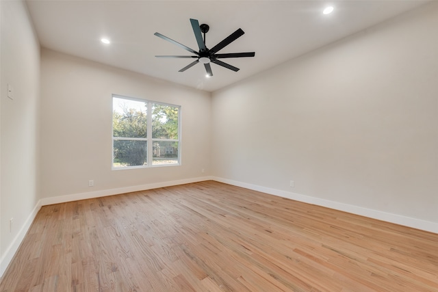 empty room featuring light hardwood / wood-style floors and ceiling fan