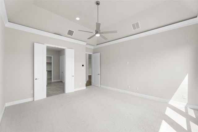 unfurnished bedroom featuring light carpet, ornamental molding, and ceiling fan