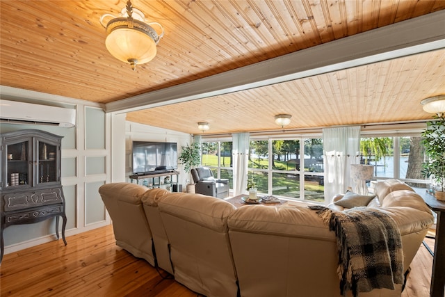 living room with a healthy amount of sunlight, a wall mounted AC, wooden ceiling, and light wood-type flooring