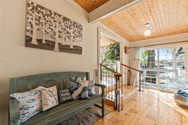 sitting room with crown molding, wooden ceiling, vaulted ceiling with beams, and hardwood / wood-style floors