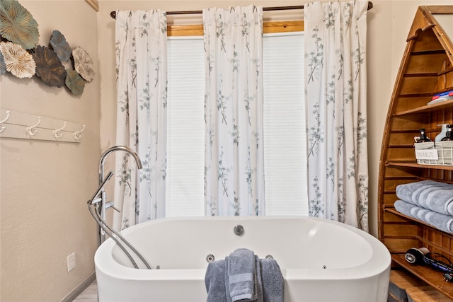 bathroom featuring a bathtub