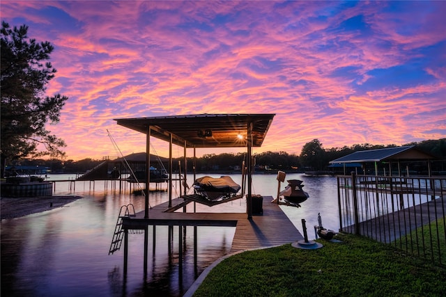 dock area with a water view