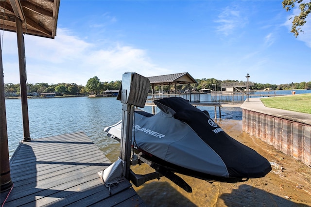 dock area featuring a water view