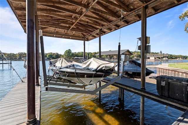 view of dock with a water view