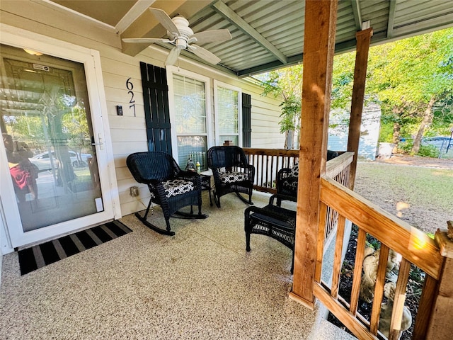 exterior space featuring ceiling fan