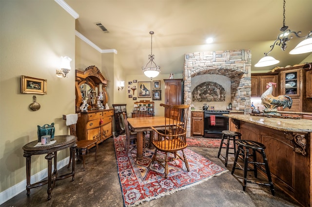 dining room featuring crown molding