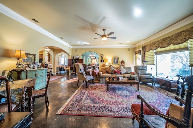 living room featuring ornamental molding and ceiling fan