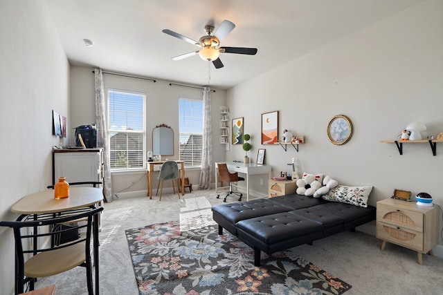 bedroom featuring ceiling fan and light colored carpet