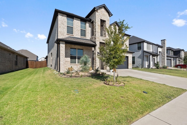 view of front facade with a garage and a front lawn