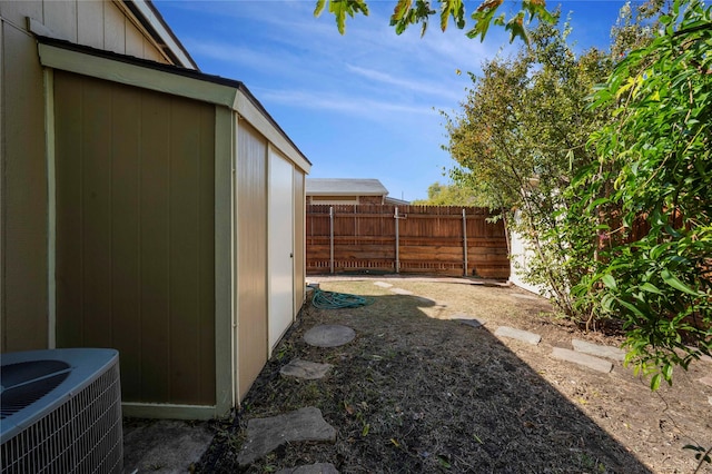 view of yard with central AC unit