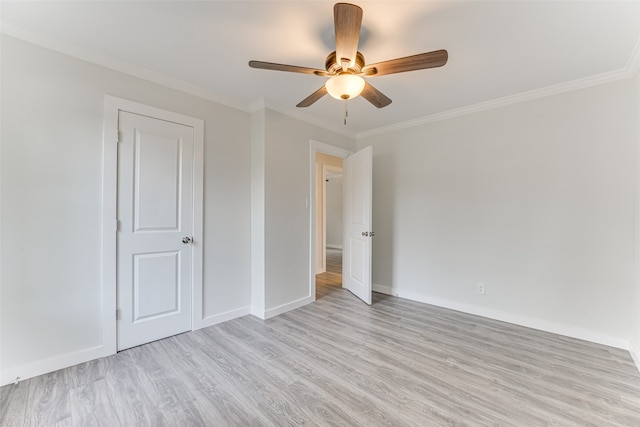 unfurnished bedroom with crown molding, light hardwood / wood-style floors, and ceiling fan