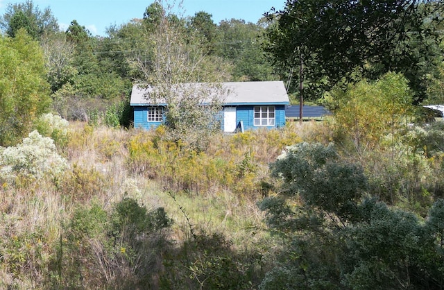 396 Fcr Unit 261, Oakwood, TX 75855 - back of property featuring a forest view