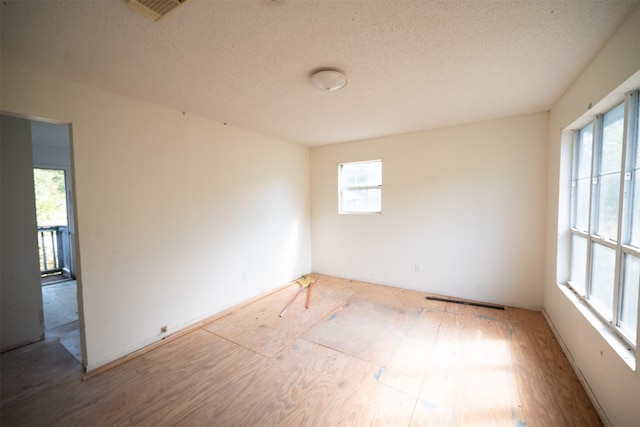 396 Fcr Unit 261, Oakwood, TX 75855 - spare room with a textured ceiling