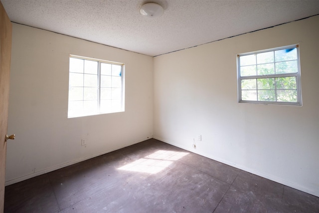 396 Fcr Unit 261, Oakwood, TX 75855 - empty room featuring a textured ceiling and baseboards
